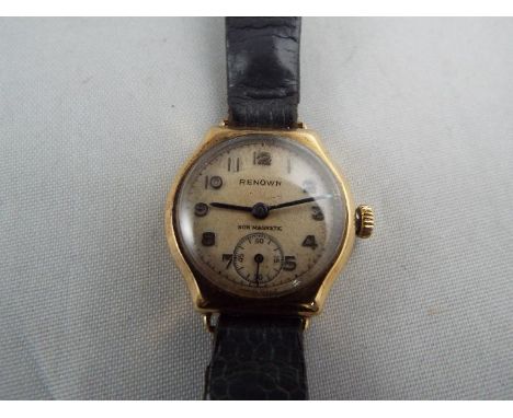 A 9 carat gold cased lady’s wristwatch by jewellers Bravingtons, mechanical manual wind on a leather band, approx. case weigh
