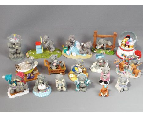 A collection of 'Me To You' bear figurines and a Disney musical snow globe.