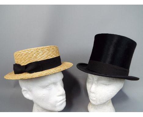 Two vintage hats comprising a Cuthbertson top hat (approximately 55 cm internal circumference) and a straw boater (approximat