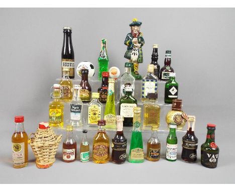 A good mixed lot of approx 30 miniature collectables to include a ceramic Beneagles Scotch whisky 70˚ proof,  ceramic footbal