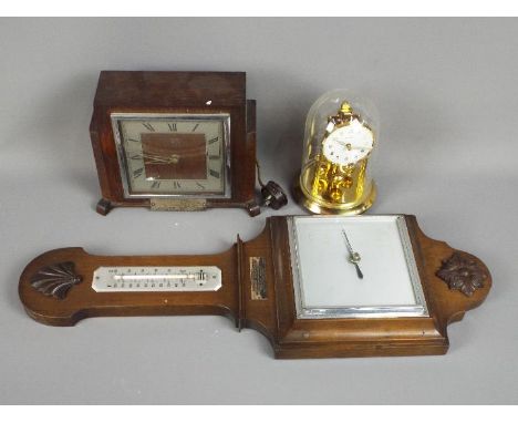 A Smiths Sectric mantel clock, a Bentima anniversary clock, A Barometer / Thermometer on oak base with white metal plaque scr