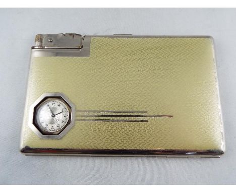 An Art Deco cigarette case or card holder with integral watch and lighter, engine turned decoration and light green enamellin