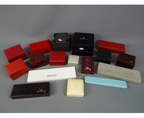 A collection of vintage and modern watch and jewellery boxes to include Tag Heuer, Rotary and other.