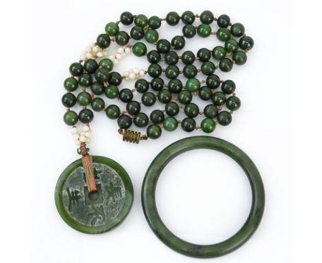 Grouping of Two (2) Chinese Jade Jewelry Items. Includes: single strand beaded jade necklace and pendant with bangle bracelet