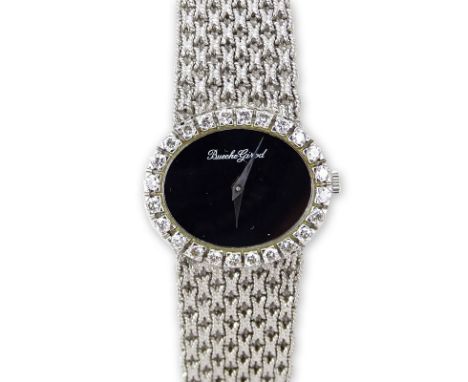 Lady's 18 Karat White Gold Bueche-Girod Bracelet Watch with Diamond Bezel and Manual Movement. Signed 750, WG 9801Very good c