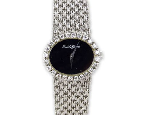 Lady's 18 Karat White Gold Bueche-Girod Bracelet Watch with Diamond Bezel and Manual Movement. Signed 750, WG 9801Very good c