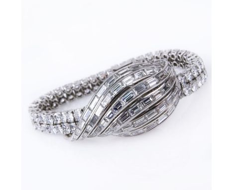 Vintage Jaeger LeCoultre Approx. 25.0 Carat Round Brilliant and Baguette Cut Diamond and Platinum Bracelet Watch. Diamonds E-