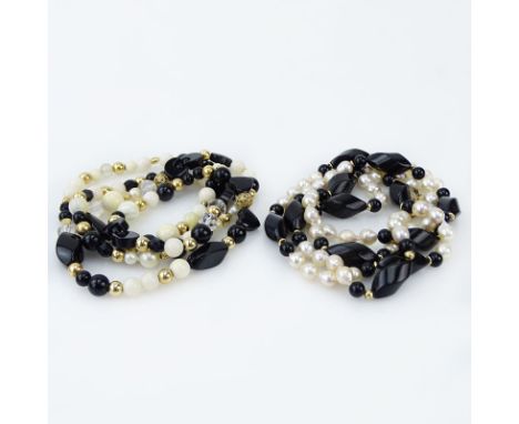 Two (2) Pearl, Black Onyx and Bead Necklaces. Clasp signed 14K. Good condition. Longer measures 17-1/2" L. Shipping $30.00 (e