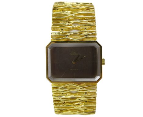 Rare Circa 1965 Gilbert Albert Design 18 Karat Yellow Gold Omega d'Or Model Free Formed Bracelet Watch with Rock Crystal top.