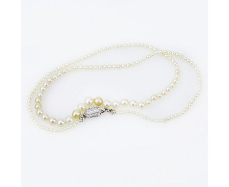 Exquisite Cartier GIA Certified Art Deco Graduated Natural Saltwater Pearl Necklace with Platinum and Diamond Clasp. Pearls m