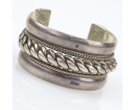Vintage Persian Heavy Silver Cuff Bangle Bracelet. Hallmarked. Surface wear from normal use. Measures 1-3/8" W, 2-1/4" interi
