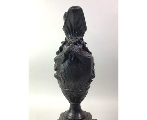 MODERN RESIN JUG, AND A WOODEN CANDLESTICK the resin jug of neo classical design54cm highQty: 2