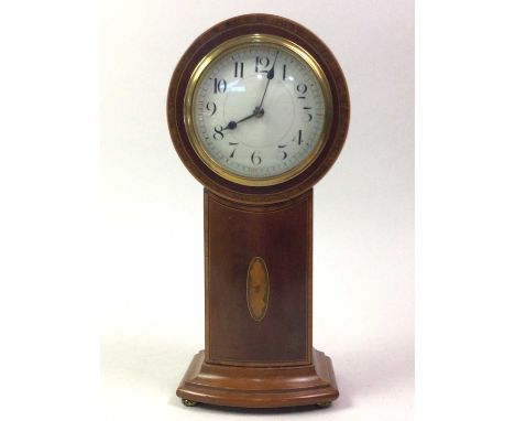 EDWARDIAN MANTEL CLOCK, inlaid, on a stepped base, bun feet and with key25.8cm high