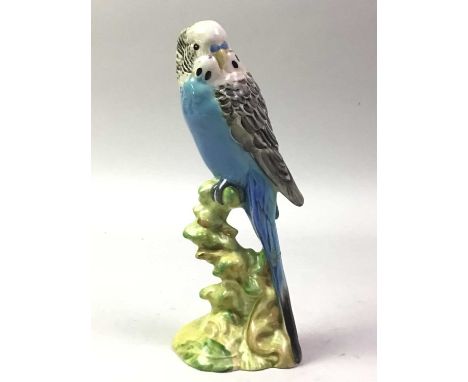 BESWICK MODEL OF A BIRD, modelled as a budgie, marked to base17.4cm high