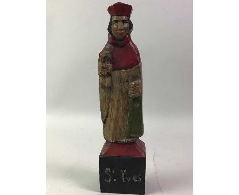 GROUP OF RELIGIOUS ITEMS, comprising a figure modelled as St. Yves, another wooden figure, a framed portrait and a small pict