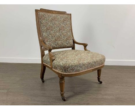 LATE VICTORIAN ROSEWOOD NURSING CHAIR, on ceramic castors