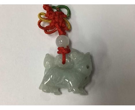 GROUP OF JEWELLERY, comprising an amber beeded necklace and jade pendantsQty: 4