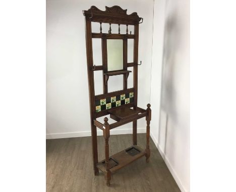 VICTORIAN OAK HALL STAND, with mirror back, tile inset with original hooks and drip trays200cm high, 71cm wide