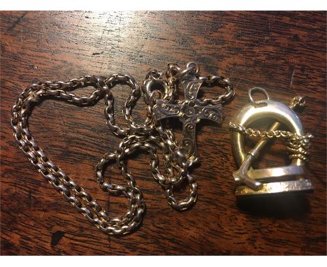 Ladies 9ct gold chain and crucifix with a delightful hunting theme charm 10.2 gross