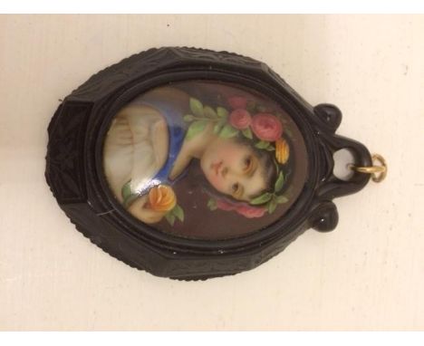 Good quality Whitby jet brooch with finely painted portrait of a lady.