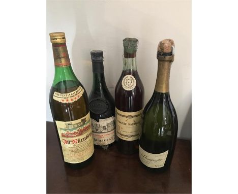 Four bottles vintage brandy inc. Alt Nürnberg, Delamain & Co. Cognac Napoleon & Marc Champagne