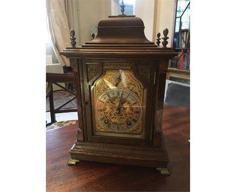 Winterhalder and Hofmeier oak mantle clock striking Westminster chimes on a gong