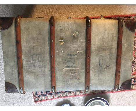 Vintage steamer trunk with wooden fitting by A W Gamage Ltd.
