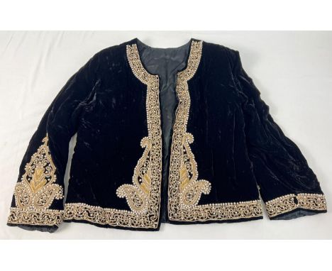 A vintage black velvet jacket with beaded and metallic thread detail. Heavily detailed bead and thread detail to cuffs, front