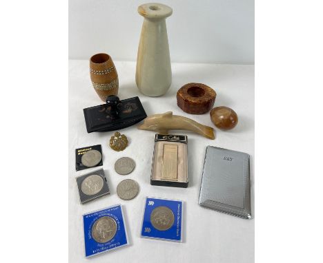 A collection of misc items. To include soapstone candlestick and dolphin, a treen pot with mother of pearl inlay detail, a bo