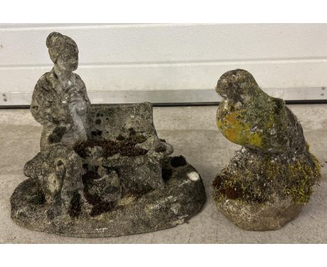 2 vintage concrete garden ornaments. A woman seated on a bench (approx. 33cm tall x 41cm long) together with a bird. 