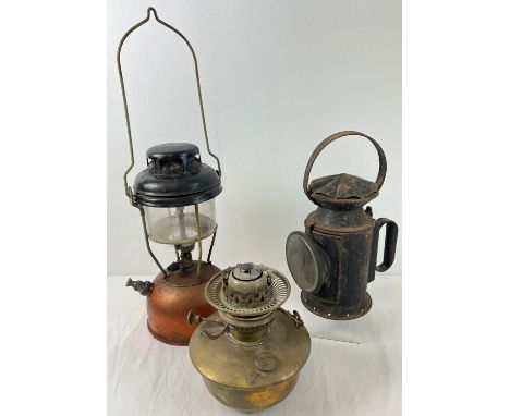 A 1943 black painted railway lamp with clear glass front and Sherwood's ceramic wick holder. Marked 1943 with War department 