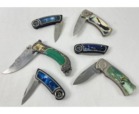 6 collectors penknives and survival knives. All with decorative handles. To include wolf design, eagle design and classical f