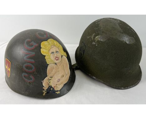 US M1C airborne/paratrooper helmet body with M1 infantry liner, used in the Vietnam War. The shell is coated in rough texture