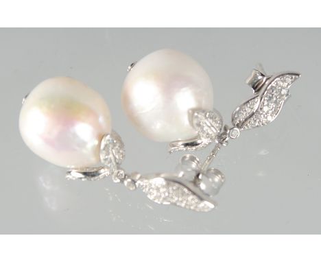 A PAIR OF SILVER BAROQUE PEARL EARRINGS.
