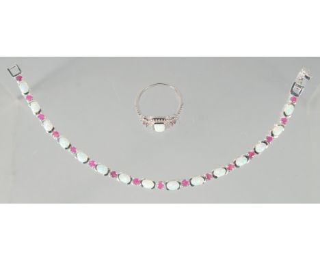 A GOOD SILVER OPAL AND RUBY BRACELET AND RING.