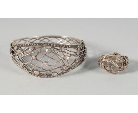 A SILVER OPEN WEAVE BANGLE AND RING.