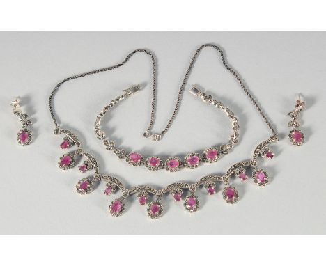 A GOOD SILVER RUBY AND MARCASITE NECKLACE, BRACELET AND EARRING SET.