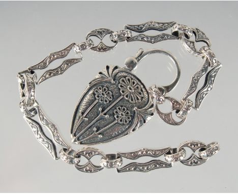 A SILVER BRACELET WITH MOTHER OF PEARL PADLOCK.
