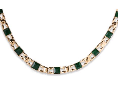 A FACETED JADE NECKLACE
Featuring faceted jade pieces mounted in a yellow gold setting marked '750' for 18K to the clasp.
44c