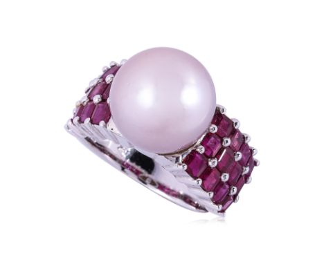 A CULTURED PEARL AND RUBY RING Featuring a round cultured pearl measuring approximately 11.5mm, mounted in a white gold setti