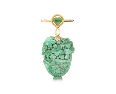 A JADE 'FLOWER BASKET' BROOCH Featuring a carved jade 'flower basket' attached to an unmarked yellow metal setting, with a he