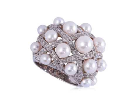 A CULTURED AKOYA PEARL AND DIAMOND RING Featuring round cultured akoya pearls measuring 3.5 to 6.0mm, mounted in a white gold