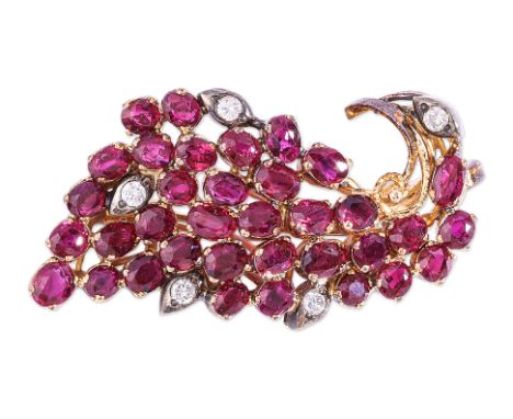 A RUBY AND DIAMOND 'BIRD' BROOCH Featuring oval cut rubies totalling approximately 3.50 Cts, mounted in an unmarked yellow go