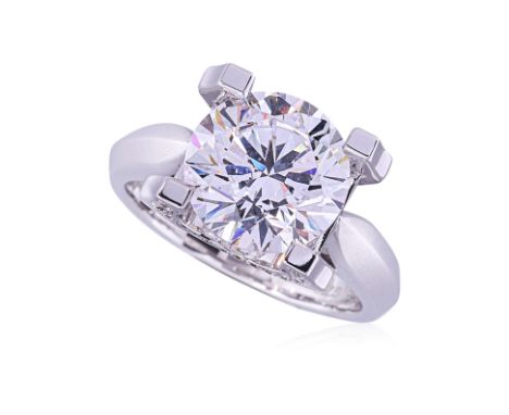 A PASTE AND DIAMOND RING Featuring a paste stone, mounted in a white gold setting marked 'G750' for 18K, accented with round 