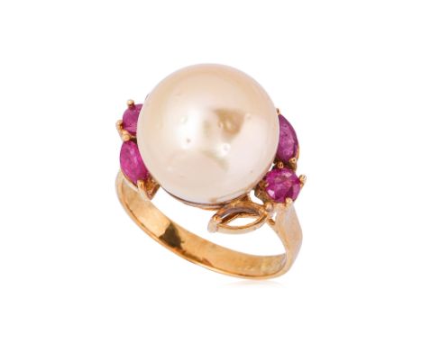 A CULTURED SOUTH SEA PEARL AND RUBY RING
Featuring an off round shaped cultured south sea pearl measuring approximately 12.6m