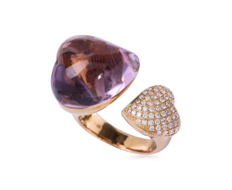 AN AMETHYST AND DIAMOND 'TOI ET MOI' RING Featuring a heart shaped amethyst weighing approximately 18.17 Cts (marked), mounte
