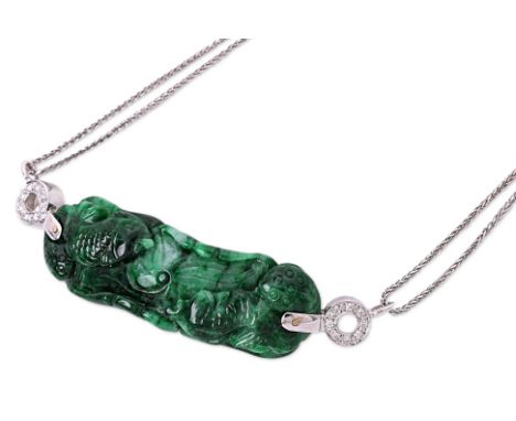 A JADE AND DIAMOND PENDANT NECKLACE
Featuring a carved jade piece depicting fishes and lotus, mounted to an unmarked white go