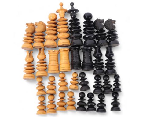 A Vintage boxwood and ebonised turned chess set, King height 11cm 