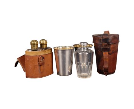 A leather-cased cut-glass spirit flask, and a pair of scent bottles with brass stoppers, in leather carrying case, H13cm 