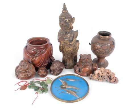 A 19th century carved wood and gilded temple figure, H29cm, a nut carved dog of fo lid, various other carved wood Buddhas, a 